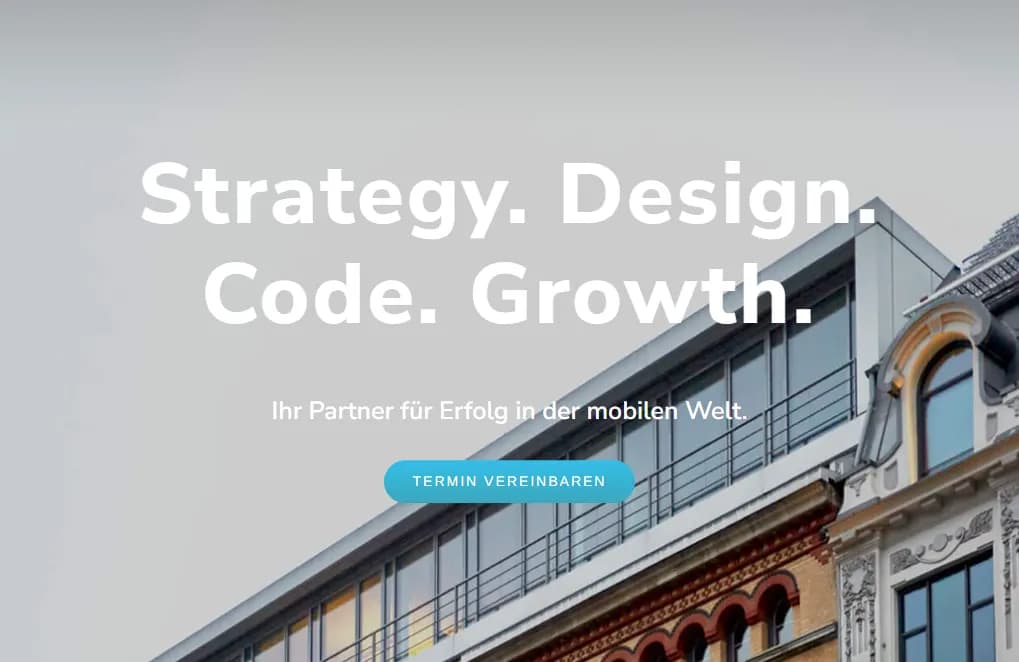 Apploft website banner featuring a modern building and their core services: Strategy, Design, Code, and Growth