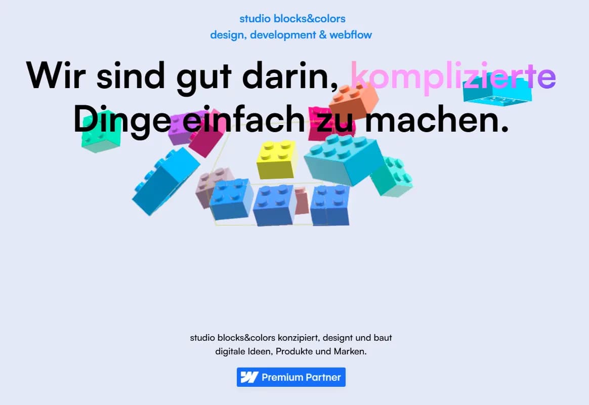 Startseite der Agentur Blocks & Colors mit bunten 3D-Bausteinen und dem Slogan, komplizierte Dinge einfach zu machen